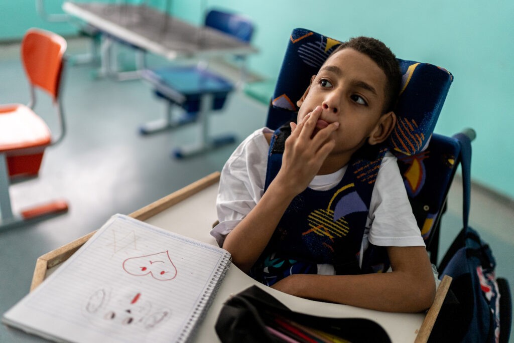 Boy with special needs in the classroom